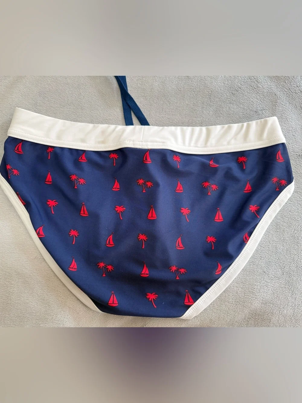 Andrew Christian Men's Navy Blue Tropical Print lined Swim Briefs. Size large.
